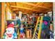 Organized shed interior with ample storage shelves, bins, and seasonal decor at 2540 E Sparrow Way, Pahrump, NV 89048