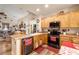 Kitchen with stainless steel appliances and wooden cabinetry at 2540 Sparrow Way, Pahrump, NV 89048