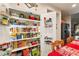 Well-organized pantry with ample shelving for storage at 2540 Sparrow Way, Pahrump, NV 89048