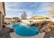 Stunning pool with waterfall feature at 2540 Sparrow Way, Pahrump, NV 89048