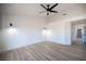 Bright bedroom with ceiling fan and elegant wall sconces at 2541 Showcase Dr, Las Vegas, NV 89134