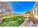 Green lawn, stone pathway, and mountain views at 2589 Sumter St, Henderson, NV 89052