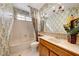 Charming bathroom with patterned wallpaper and updated fixtures at 2589 Sumter St, Henderson, NV 89052