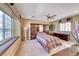 Secondary bedroom with wine cellar access and built-ins at 2589 Sumter St, Henderson, NV 89052