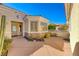 Front entry with stone accents and a paved courtyard at 2589 Sumter St, Henderson, NV 89052