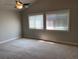 Large bedroom with ceiling fan and neutral color scheme at 2908 Channel Bay Dr, Las Vegas, NV 89128