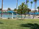 Resort-style pool with sandy beach entry and ample lounge chairs at 2908 Channel Bay Dr, Las Vegas, NV 89128