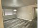 Spacious dining room with light grey wood-look flooring at 2908 Channel Bay Dr, Las Vegas, NV 89128