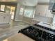 Eat-in kitchen with island, updated appliances, and view of backyard at 2908 Channel Bay Dr, Las Vegas, NV 89128