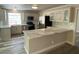 Remodeled kitchen with white shaker cabinets and marble countertops at 2908 Channel Bay Dr, Las Vegas, NV 89128