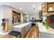 Modern kitchen with gray cabinets, large island, and stylish hexagon backsplash at 2924 Rain Lily Ct, Las Vegas, NV 89117