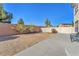 Large backyard with patio, providing additional outdoor space at 3257 Aiken St, North Las Vegas, NV 89032