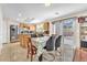 Kitchen with island, stainless steel appliances, and wood cabinets at 3257 Aiken St, North Las Vegas, NV 89032