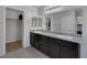 Modern bathroom with double sinks and a large mirror at 3844 Juanita May Ave, North Las Vegas, NV 89032