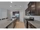 Modern kitchen with stainless steel appliances and granite countertops at 3844 Juanita May Ave, North Las Vegas, NV 89032