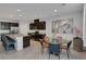 Open concept kitchen and dining area with modern finishes at 3844 Juanita May Ave, North Las Vegas, NV 89032