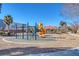 Community playground with playset and slide at 3844 Juanita May Ave, North Las Vegas, NV 89032