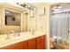 Bathroom with a double vanity and a shower/tub combo at 3905 Blairmoor St, North Las Vegas, NV 89032