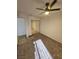 Bedroom with mirrored closet doors and ceiling fan at 4017 Danford Pl, Las Vegas, NV 89102