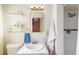 Clean bathroom with a shower, sink, and gold-toned accents at 4116 E Ogden Ave, Las Vegas, NV 89110