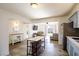 Open concept kitchen with island, looking into living room at 4116 E Ogden Ave, Las Vegas, NV 89110