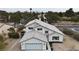 Aerial view of two story house with grey roof at 5236 Woodlawn Ln, Las Vegas, NV 89130