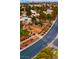 Aerial view of a residential street and homes at 5236 Woodlawn Ln, Las Vegas, NV 89130