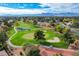 Aerial view of golf course with cart path at 5236 Woodlawn Ln, Las Vegas, NV 89130