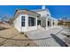 Home exterior showcasing a pergola and patio area at 5236 Woodlawn Ln, Las Vegas, NV 89130