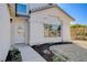 House entrance with white door and large window at 5236 Woodlawn Ln, Las Vegas, NV 89130