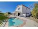 Inviting pool and spa with flagstone deck at 5236 Woodlawn Ln, Las Vegas, NV 89130