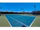 Well-maintained tennis courts ready for a match at 5236 Woodlawn Ln, Las Vegas, NV 89130