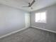 Bright bedroom with carpet, ceiling fan and closet at 5260 San Anselmo St, Las Vegas, NV 89120