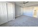 Bedroom with carpet, ceiling fan, and closet at 5260 San Anselmo St, Las Vegas, NV 89120