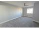 Spacious bedroom with carpet and ceiling fan at 5260 San Anselmo St, Las Vegas, NV 89120