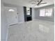 Bright living room with fireplace and tile floors at 5260 San Anselmo St, Las Vegas, NV 89120