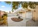 Desert landscaping and a covered patio create a low-maintenance backyard retreat at 5804 Sassa St, Las Vegas, NV 89130