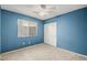 Carpeted bedroom with a closet and a window at 5804 Sassa St, Las Vegas, NV 89130