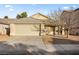 Charming single-story home with a two-car garage and low-maintenance landscaping at 5804 Sassa St, Las Vegas, NV 89130