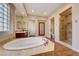 Bathroom with a large soaking tub and walk-in shower at 59 Portezza Dr, Henderson, NV 89011