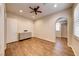 Bright bedroom with wood floors and ceiling fan at 59 Portezza Dr, Henderson, NV 89011