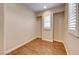 Small bedroom with wood floors and window shutters at 59 Portezza Dr, Henderson, NV 89011