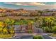 Gated community entrance with palm trees at 59 Portezza Dr, Henderson, NV 89011