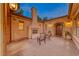 Charming courtyard with fireplace and seating area at 59 Portezza Dr, Henderson, NV 89011