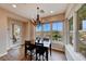 Bright dining room with scenic views and hardwood floors at 59 Portezza Dr, Henderson, NV 89011