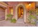 Elegant entryway with arched doorways and brick detailing at 59 Portezza Dr, Henderson, NV 89011