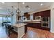 Modern kitchen with stainless steel appliances and granite counters at 59 Portezza Dr, Henderson, NV 89011