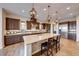 Gourmet kitchen with large island and stainless steel appliances at 59 Portezza Dr, Henderson, NV 89011