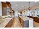 Spacious kitchen with granite countertops and hardwood floors at 59 Portezza Dr, Henderson, NV 89011