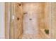 Walk-in shower with tiled walls and built-in seat at 59 Portezza Dr, Henderson, NV 89011